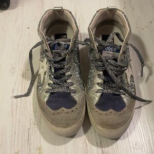 worn a lot golden goose.